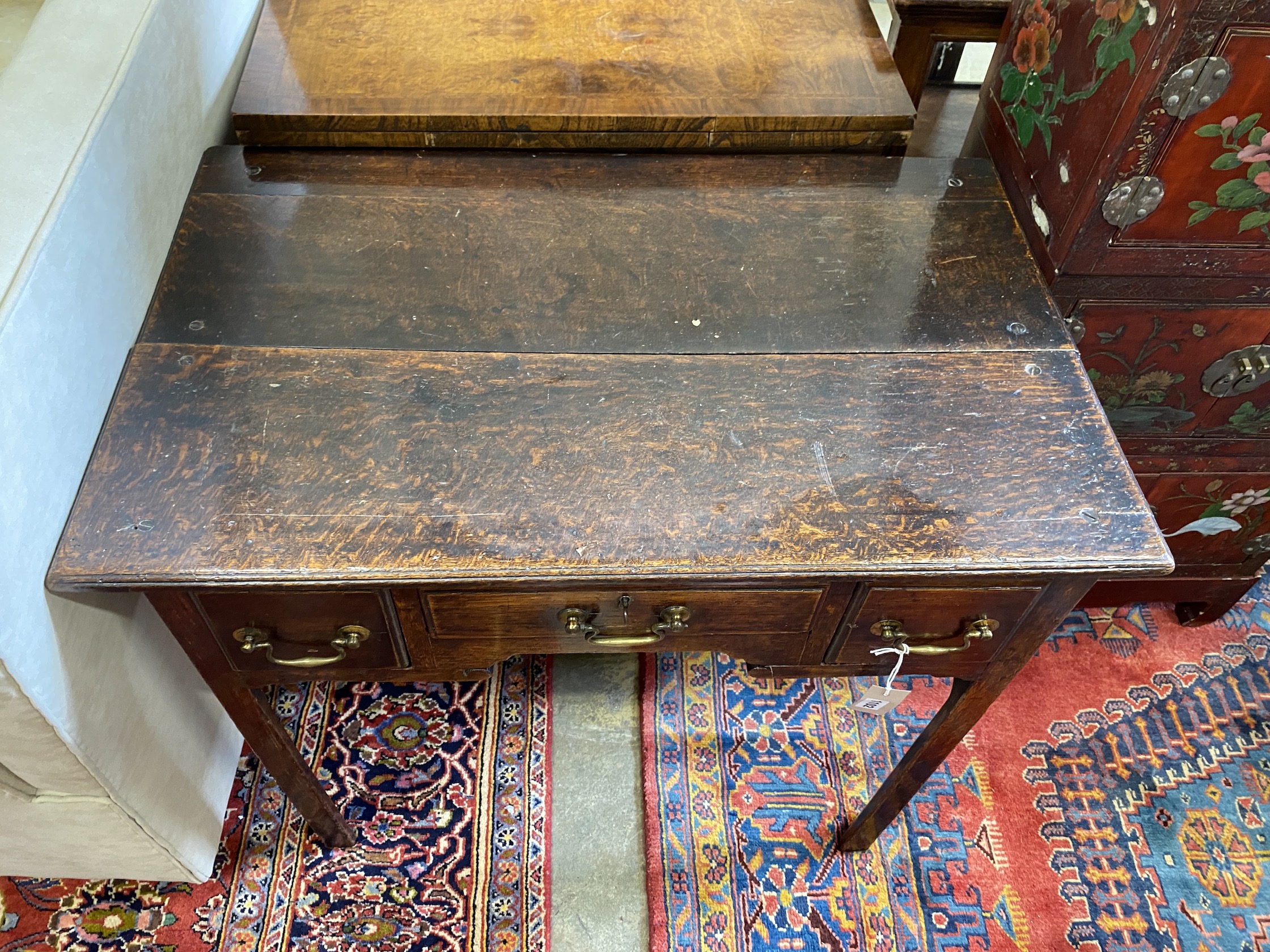A George III oak lowboy, width 82cm, depth 51cm, height 73cm